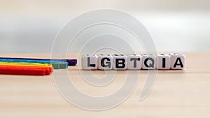 Close-upÃÂ imageÃÂ ofÃÂ LGBTQIAÃÂ cubeÃÂ onÃÂ theÃÂ softÃÂ background. Concept about various love. photo